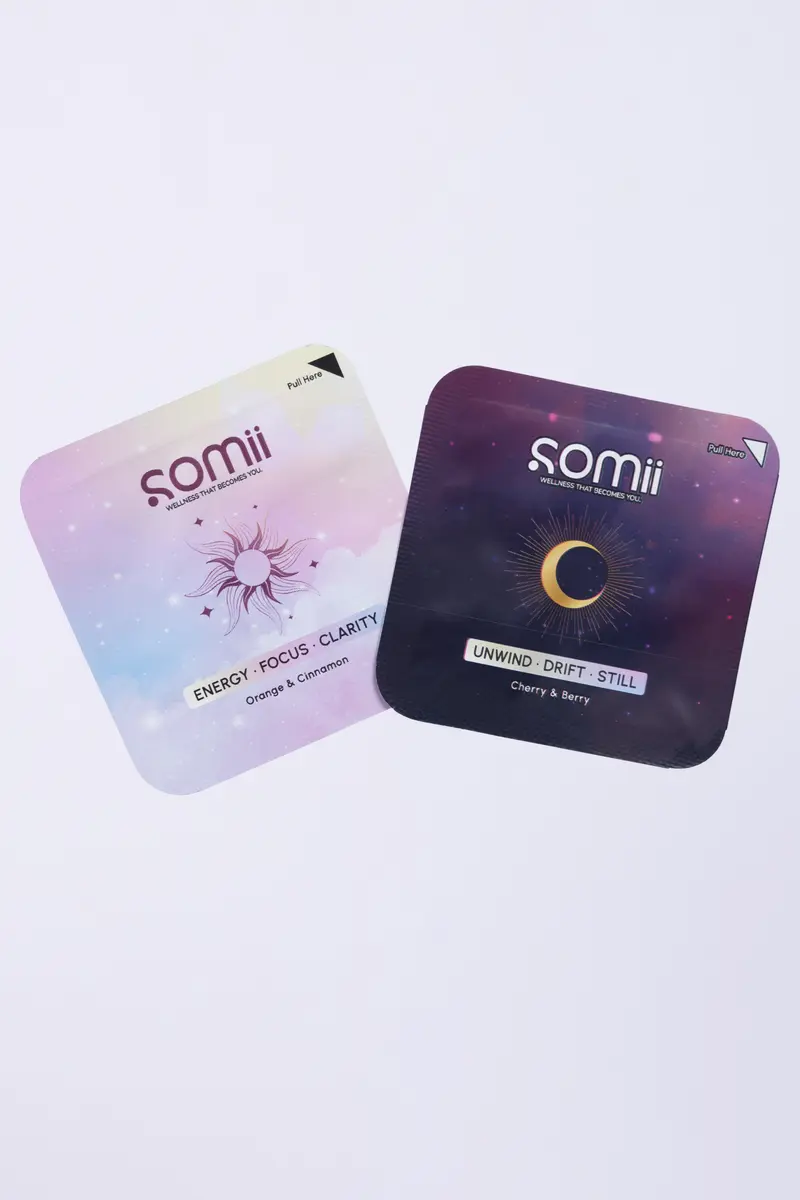 Somii's morning and evening strip sachets floating side by side against a pale background